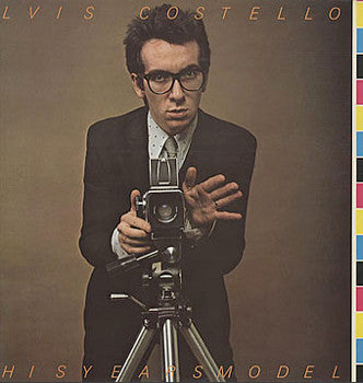 Elvis Costello & The Attractions - This Year's Model (LP, Album) - De Platen Aap – Vinylwinkel in Brielle & online webshop voor muziekliefhebbers