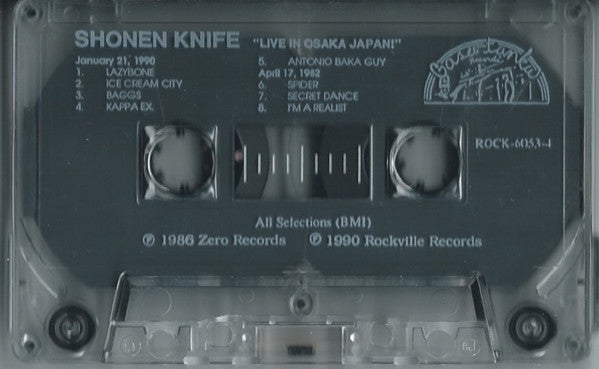 Shonen Knife - Pretty Little Baka Guy + Live In Japan! (Cass) - De Platen Aap – Vinylwinkel in Brielle & online webshop voor muziekliefhebbers