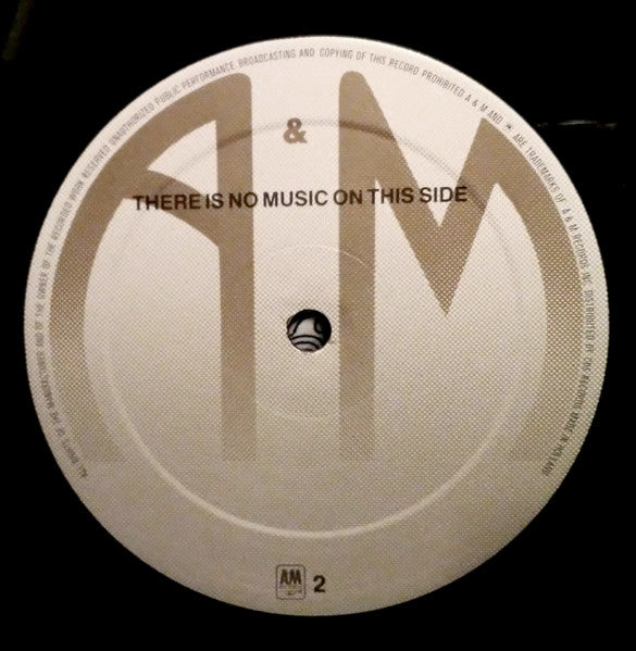 Joe Jackson : The Real Men EP (12", S/Sided, EP, Maxi)